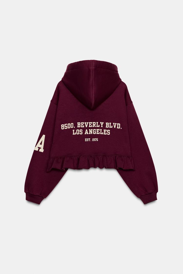 VARSITY SWEATSHIRT WITH RUFFLE TRIM